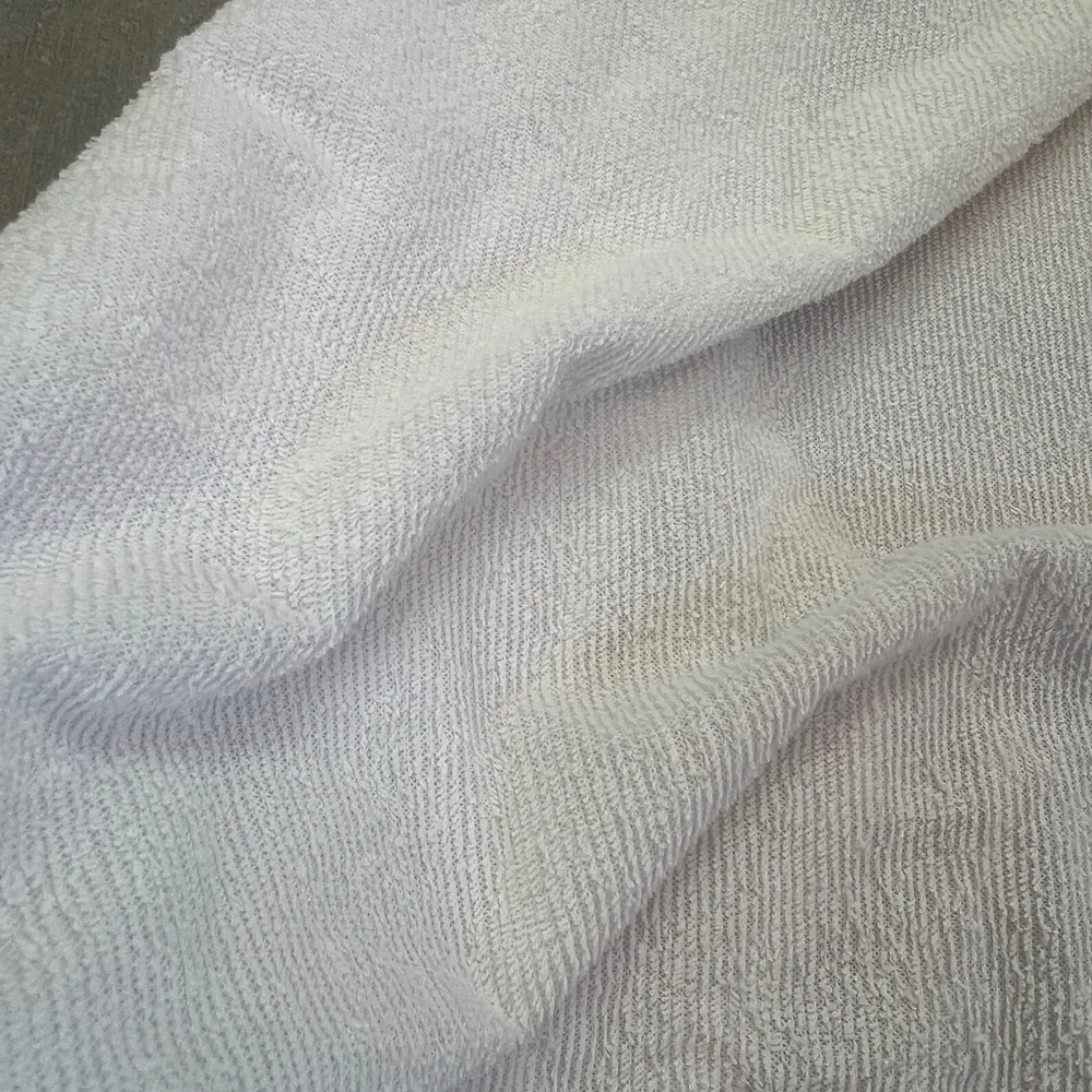 White twin waterproof mattress cover - to protect twin sized mattress. Like new
